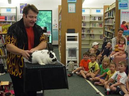 Fiona at a library magic show